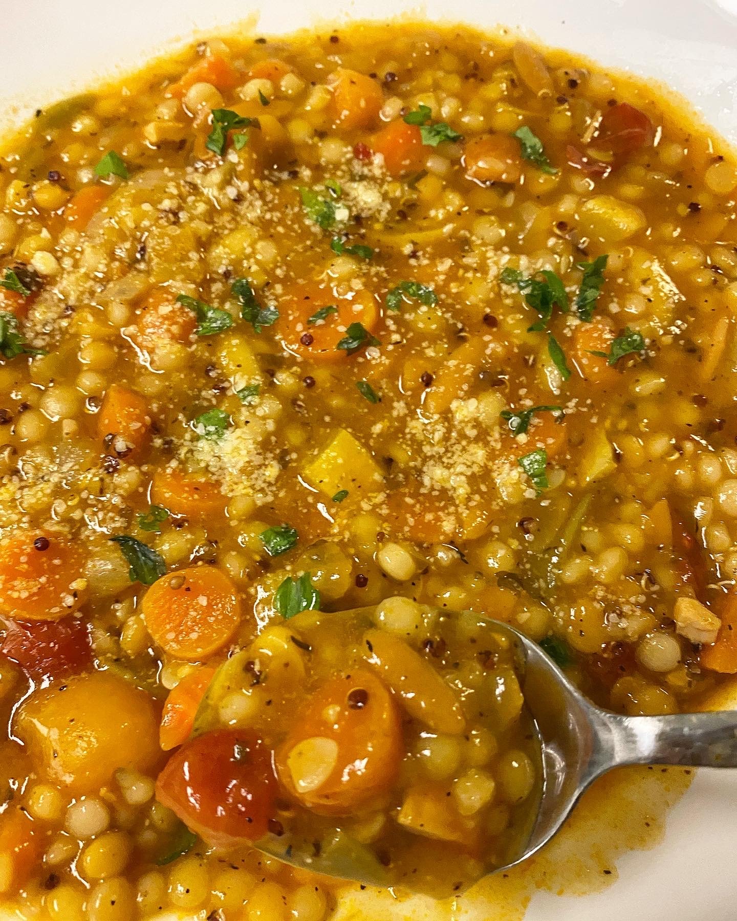 A comforting vegetable dish in a bowl.